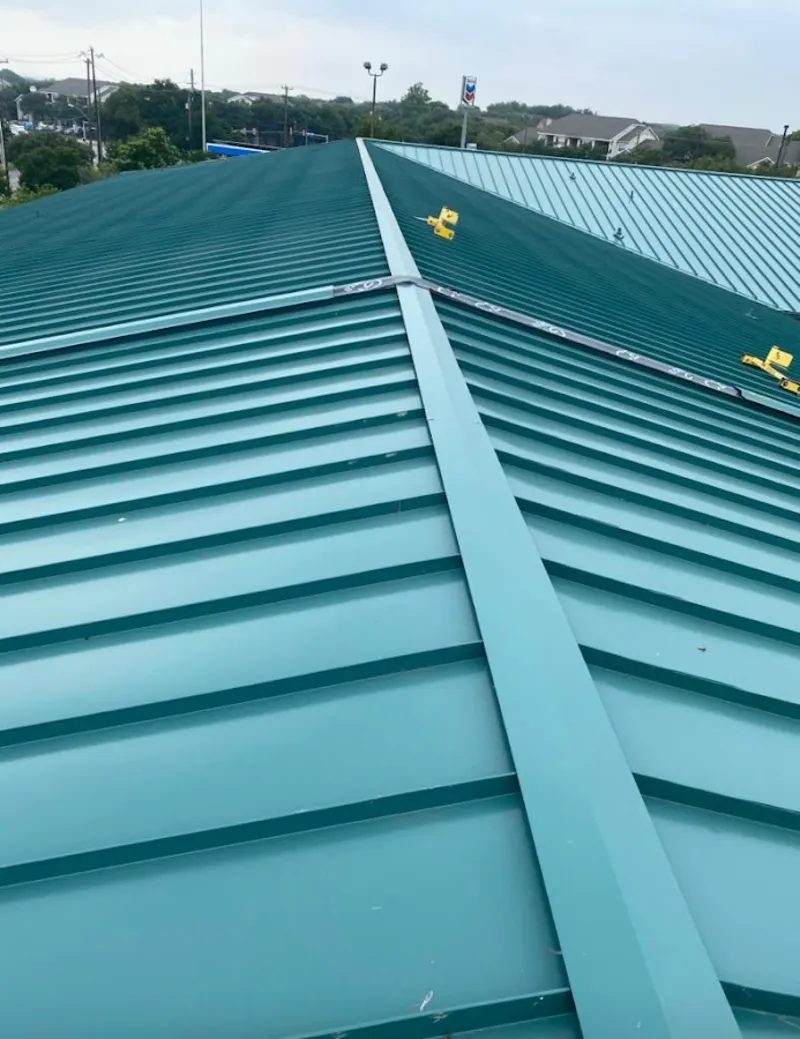 Green commercial metal roof ridge and valley for Metal Roof Repair in Mexia