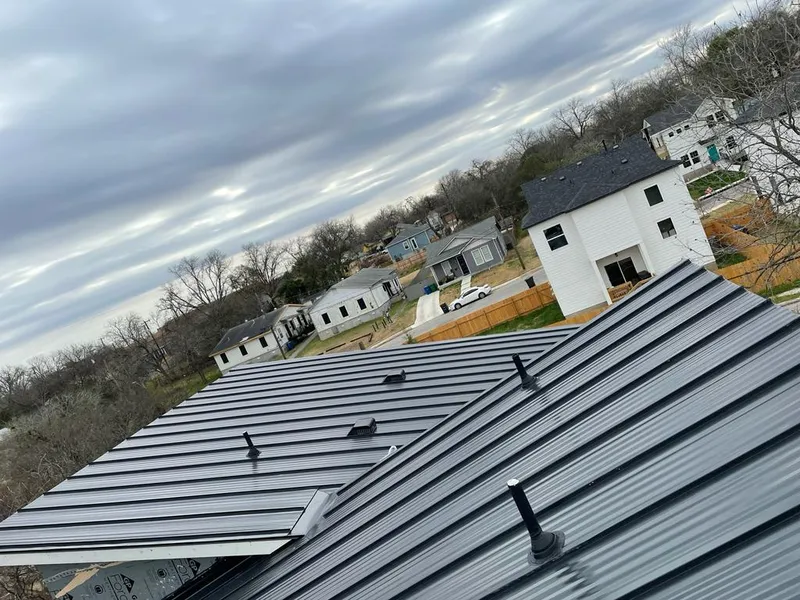 Standing seam metal roof panels with vents for Skylight Repair in Mexia